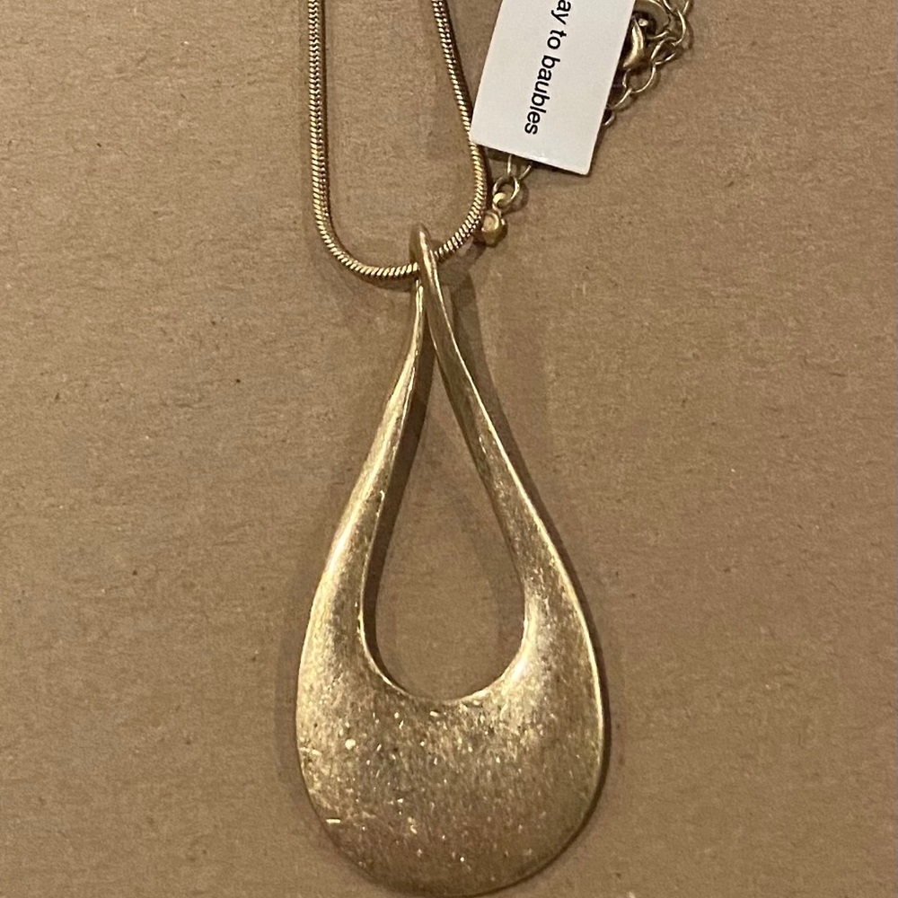 NWT! Gold colored with teardrop shaped charm